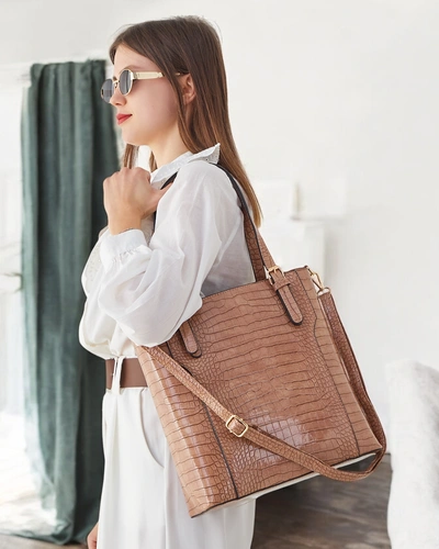 Royalfashion Lacquered women's handbag with embossing