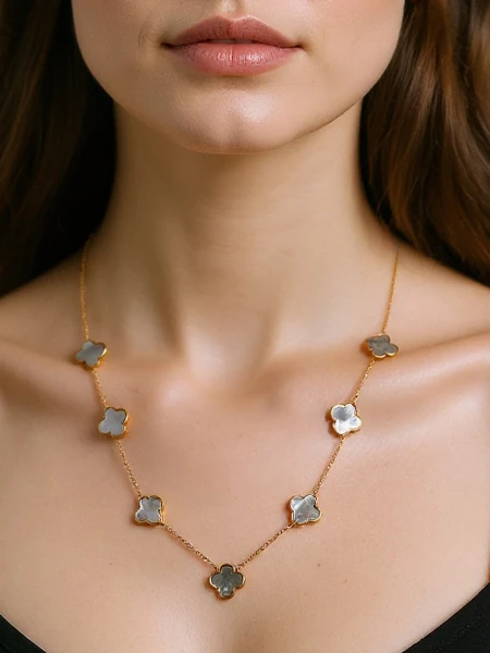 Aurelia Clavis mother-of-pearl necklace in a gold setting