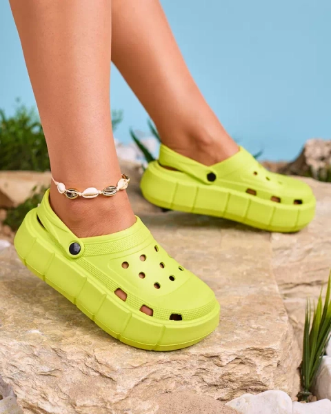 Royalfashion Neon green women's flip-flops with openwork trim Mightty