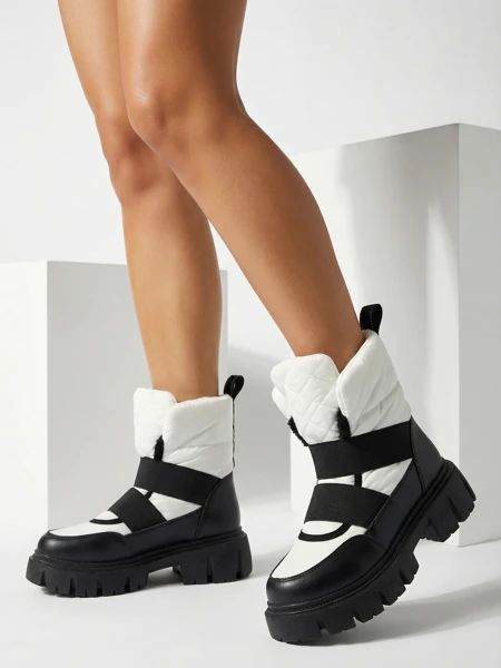 Women's snow boots on a flat sole in black and white Ferory- Footwear