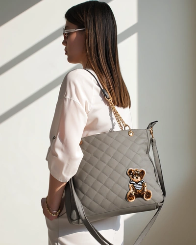 Royalfashion Quilted women's handbag made of eco-leather with a teddy bear