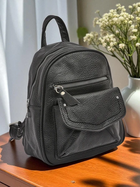 Astrea Królewska Moda women's black and white faux leather backpack