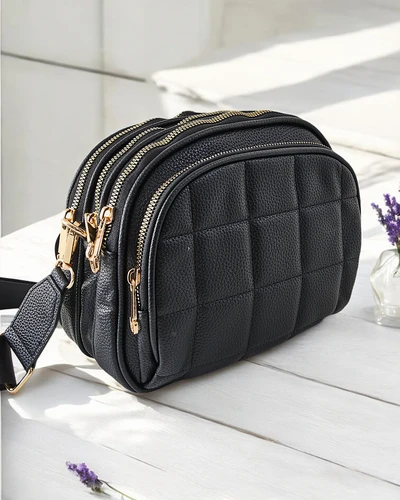 Royalfashion Small oval women's handbag made of eco-leather