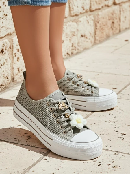 Royalfashion Women's perforated sneakers with decorations Osdo