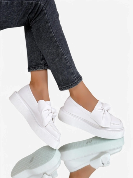 Royalfashion Elegant women's moccasins with a bow Ortto