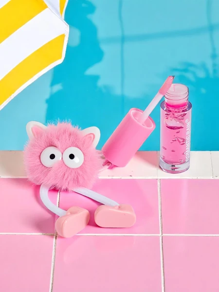 Lip gloss for children with a fluffy monster Dark Pink