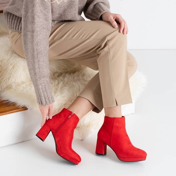 Red women's boots on the post Calida - Shoes