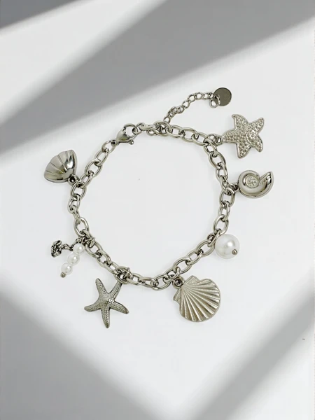 Asteria Mare Bracelet with silver sea-inspired pendants