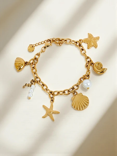 Aphrodite Maretta Gold-Plated Bracelet with Sea Charms and Pearl