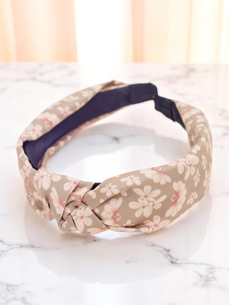 Royalfashion Hairband with braided floral pattern Florinda